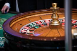 Roulette,Wheel,In,Action,On,Casino,Floor