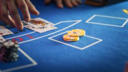 Close,Up,On,Casino,Baccarat,Gambling,Table:,Anonymous,Croupier,Dealing